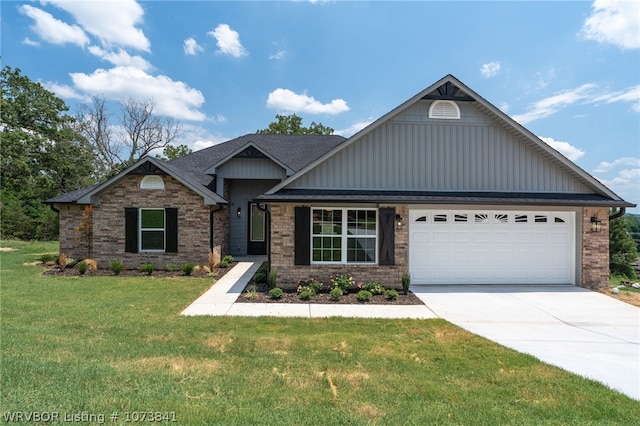 craftsman-style house featuring a front yard and a garage