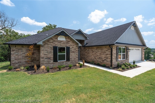 view of front facade featuring a front lawn and a garage