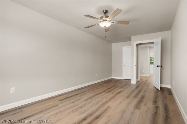 unfurnished bedroom featuring ceiling fan and hardwood / wood-style floors