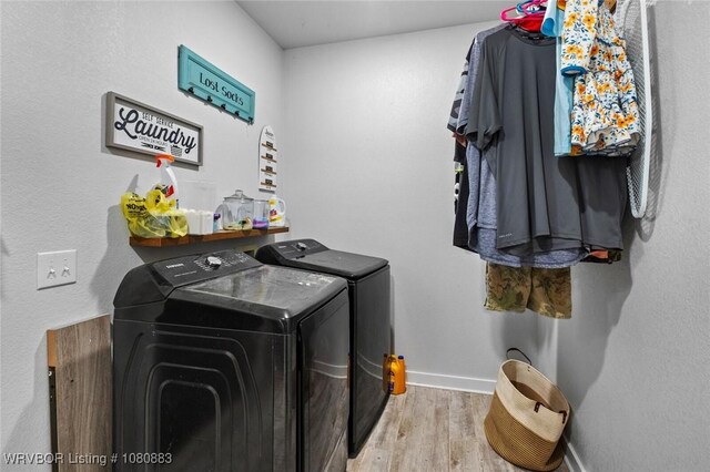 471962 E 720, Westville, OK 74965 - laundry room featuring washer and dryer, wood finished floors, and baseboards