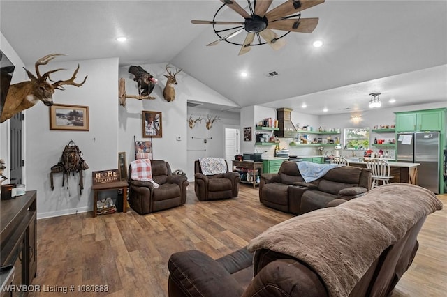 471962 E 720, Westville, OK 74965 - living area featuring ceiling fan, lofted ceiling, light wood-style floors, and recessed lighting