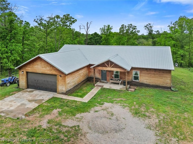 471962 E 720, Westville, OK 74965 - rustic home featuring metal roof, a front lawn, and concrete driveway