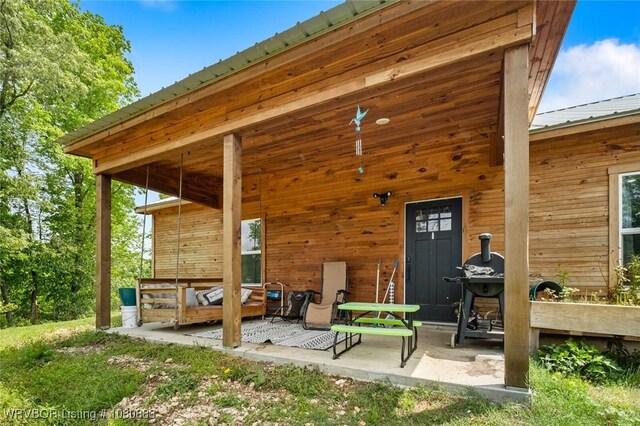 471962 E 720, Westville, OK 74965 - back of house with a patio and metal roof