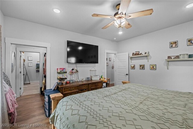 471962 E 720, Westville, OK 74965 - bedroom with wood finished floors, ceiling fan, and recessed lighting