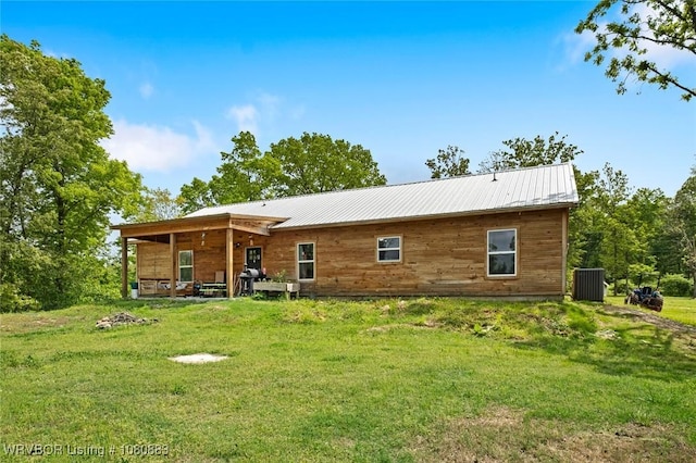 471962 E 720, Westville, OK 74965 - back of house featuring a yard, cooling unit, and metal roof