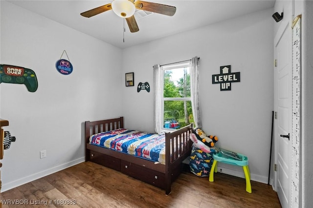471962 E 720, Westville, OK 74965 - bedroom featuring wood finished floors, baseboards, and a ceiling fan