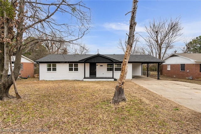 single story home with a carport