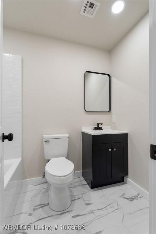 full bathroom with vanity, toilet, and washtub / shower combination