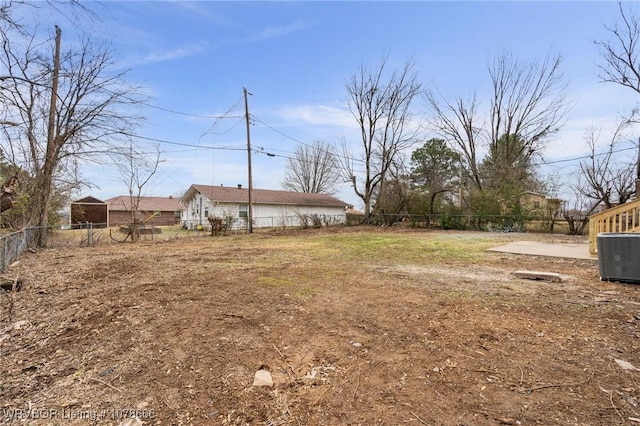 view of yard featuring central AC unit