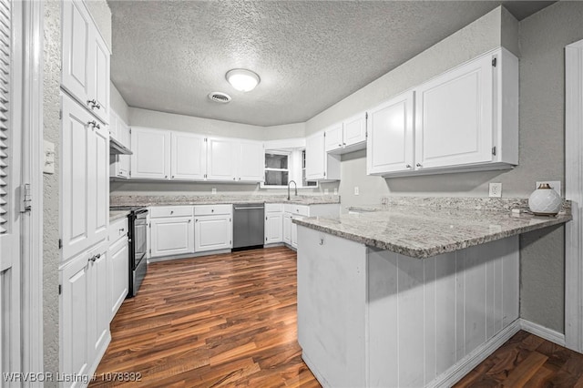 kitchen with kitchen peninsula, dishwasher, black electric range, dark hardwood / wood-style floors, and white cabinetry