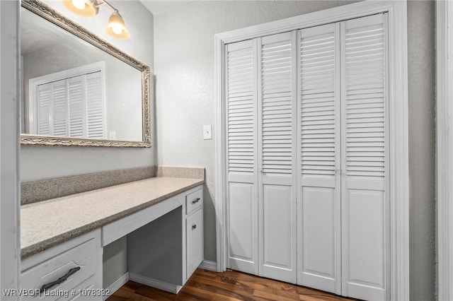 bathroom featuring hardwood / wood-style floors and vanity