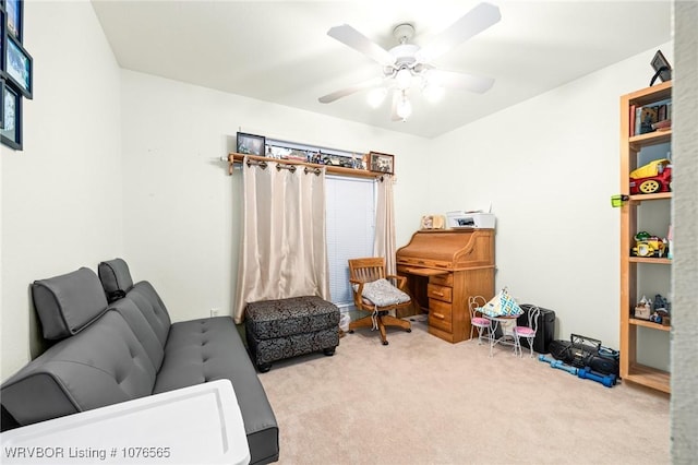 interior space with ceiling fan and light colored carpet