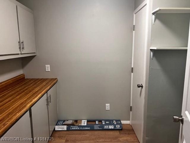 310 Butler St, Lavaca, AR 72941 - laundry area featuring dark wood finished floors