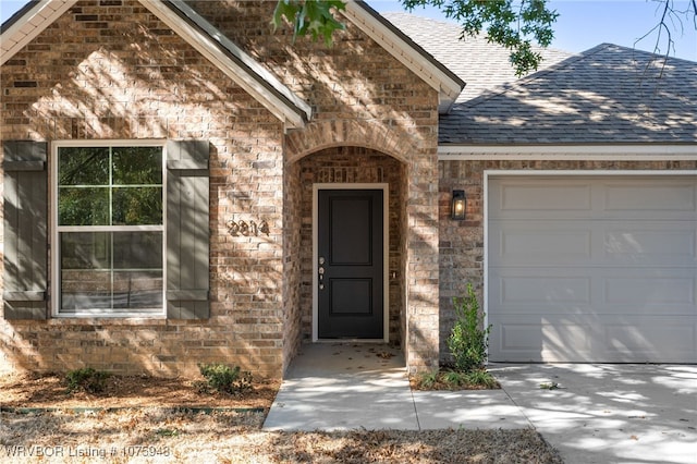 entrance to property with a garage