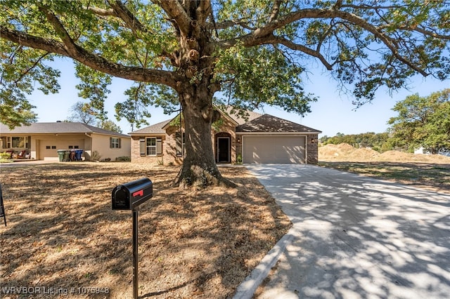 single story home with a garage