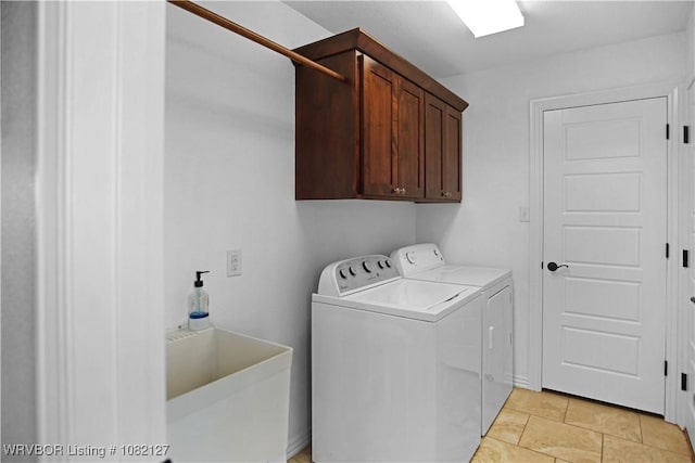 304 Rock Cir, Lavaca, AR 72941 - washroom with washer and clothes dryer, cabinet space, and light tile patterned flooring