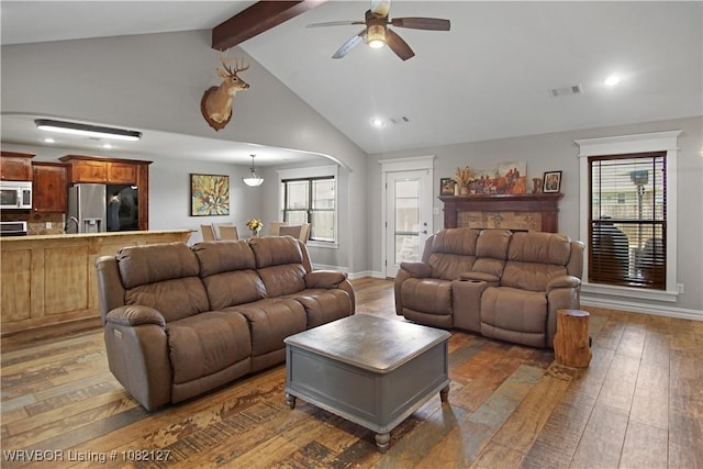 304 Rock Cir, Lavaca, AR 72941 - living room featuring a ceiling fan, hardwood / wood-style flooring, arched walkways, and recessed lighting