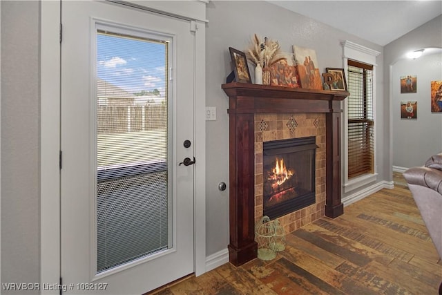 304 Rock Cir, Lavaca, AR 72941 - doorway featuring wood finished floors and a fireplace