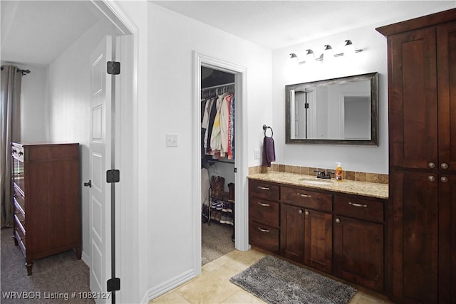 304 Rock Cir, Lavaca, AR 72941 - full bathroom featuring vanity, a spacious closet, and tile patterned flooring