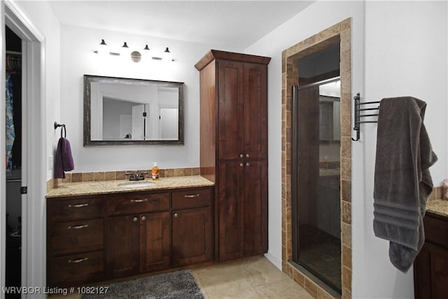 304 Rock Cir, Lavaca, AR 72941 - bathroom featuring vanity, a shower stall, and a spacious closet