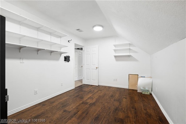 1635 Kings Way, Alma, AR 72921 - additional living space featuring a textured ceiling, wood finished floors, baseboards, and vaulted ceiling