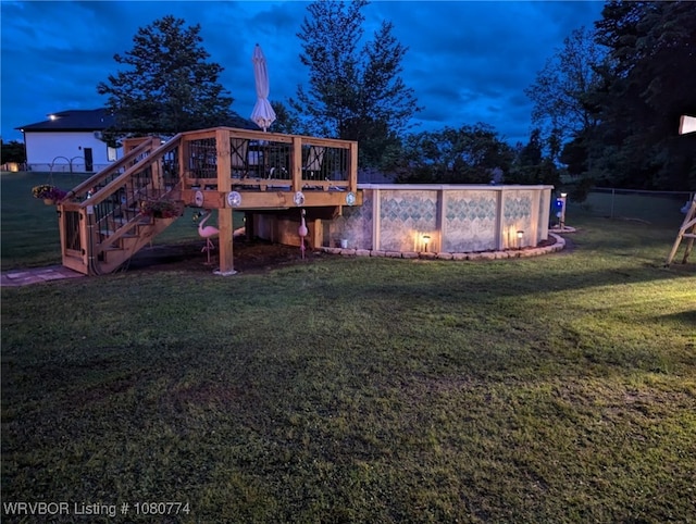 108722 4768th Rd, Roland, OK 74954 - back of house featuring fence, an outdoor pool, stairway, a wooden deck, and a lawn