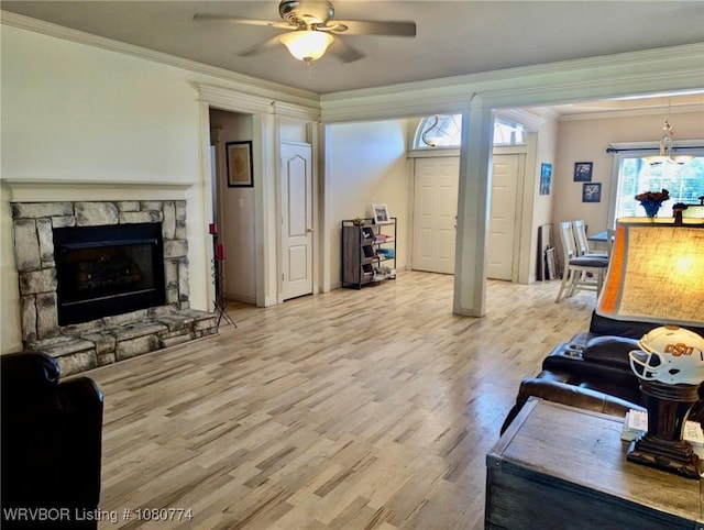 108722 4768th Rd, Roland, OK 74954 - living room featuring ceiling fan, ornamental molding, light wood-style flooring, and a fireplace