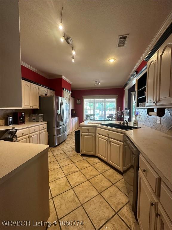 108722 4768th Rd, Roland, OK 74954 - kitchen with a sink, a peninsula, black dishwasher, visible vents, and stainless steel fridge with ice dispenser