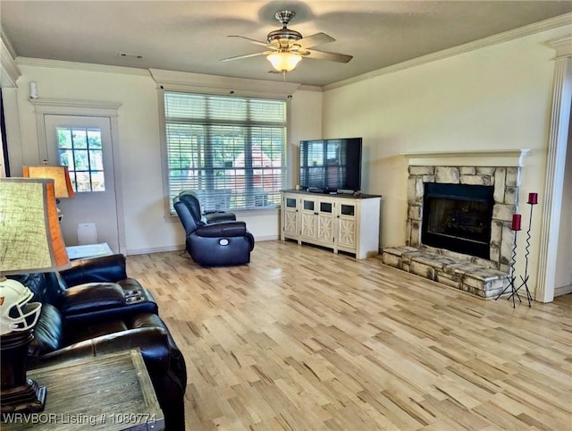108722 4768th Rd, Roland, OK 74954 - living room with crown molding, wood finished floors, ceiling fan, and a fireplace