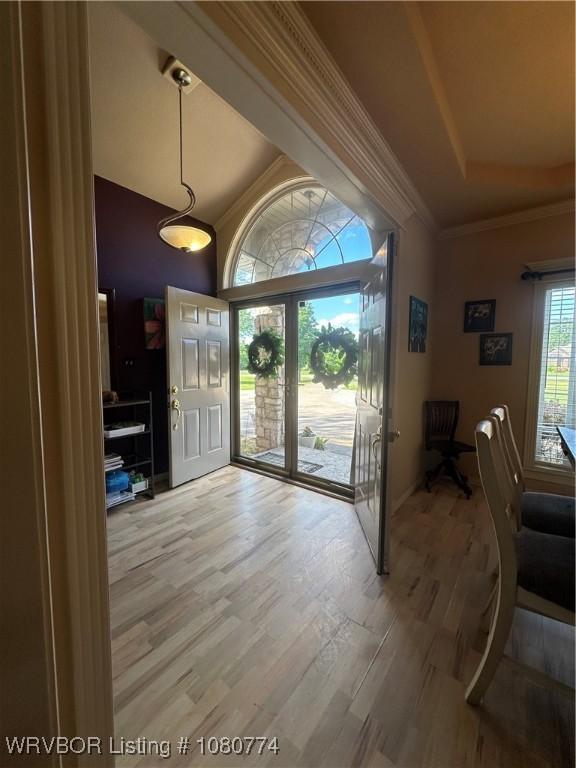 108722 4768th Rd, Roland, OK 74954 - foyer entrance with crown molding and light wood-type flooring
