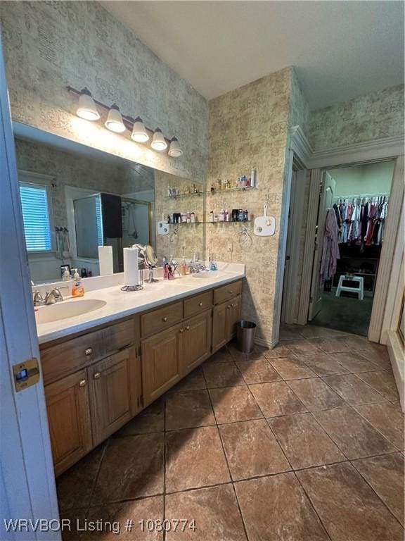 108722 4768th Rd, Roland, OK 74954 - full bath with a shower stall, tile patterned floors, double vanity, and a sink