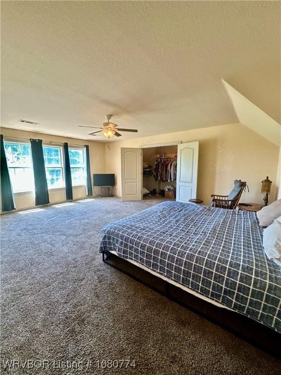 108722 4768th Rd, Roland, OK 74954 - carpeted bedroom featuring a ceiling fan, visible vents, and a textured ceiling