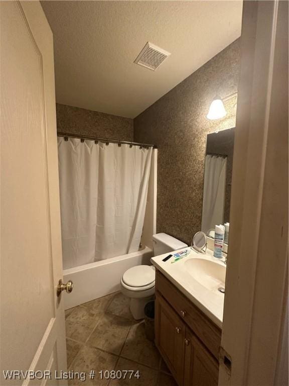 108722 4768th Rd, Roland, OK 74954 - full bath featuring vanity, shower / bath combo, tile patterned floors, a textured ceiling, and a textured wall