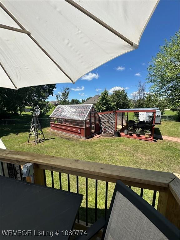 108722 4768th Rd, Roland, OK 74954 - view of yard featuring a greenhouse and an outdoor structure