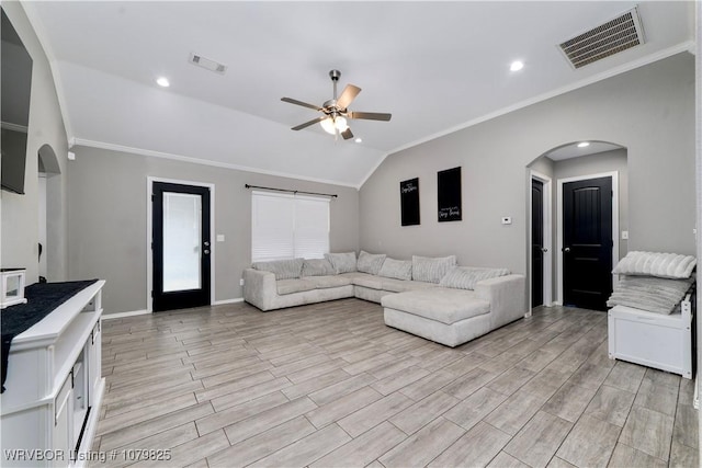 138 Stone Dr, Roland, OK 74954 - living area featuring wood tiled floor, arched walkways, ceiling fan, and visible vents