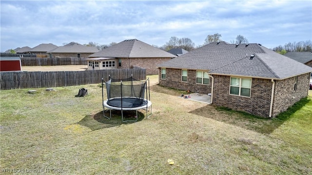 138 Stone Dr, Roland, OK 74954 - view of yard with a trampoline and fence