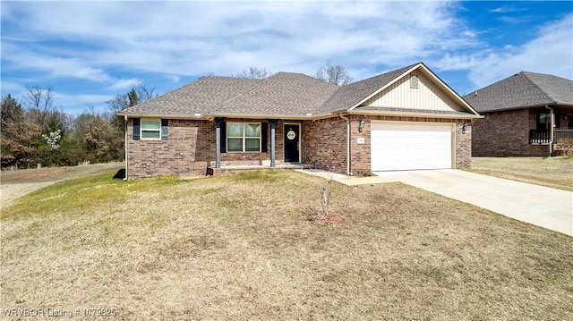 138 Stone Dr, Roland, OK 74954 - single story home with brick siding, a garage, concrete driveway, and a front yard