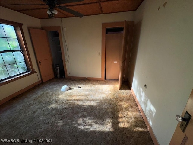 464085 E 1020th Rd, Sallisaw, OK 74955 - unfurnished bedroom featuring carpet flooring and baseboards