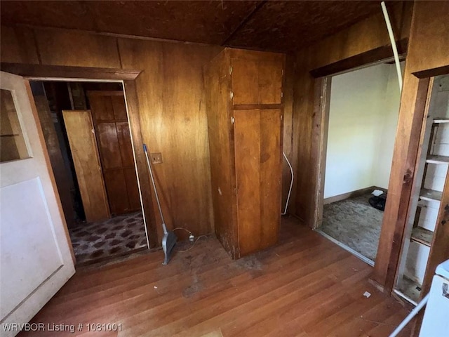 464085 E 1020th Rd, Sallisaw, OK 74955 - miscellaneous room with wood finished floors and wood walls