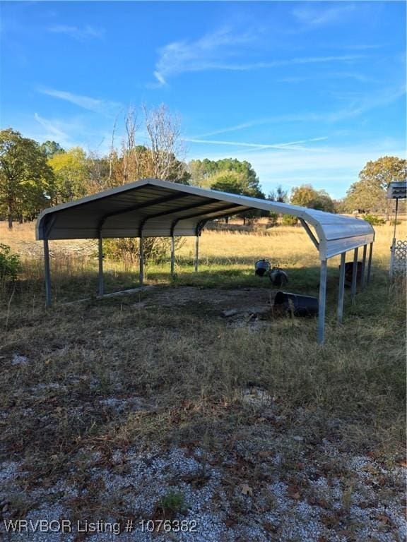 view of parking / parking lot with a carport