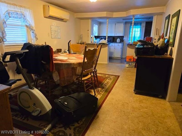 dining area featuring an AC wall unit