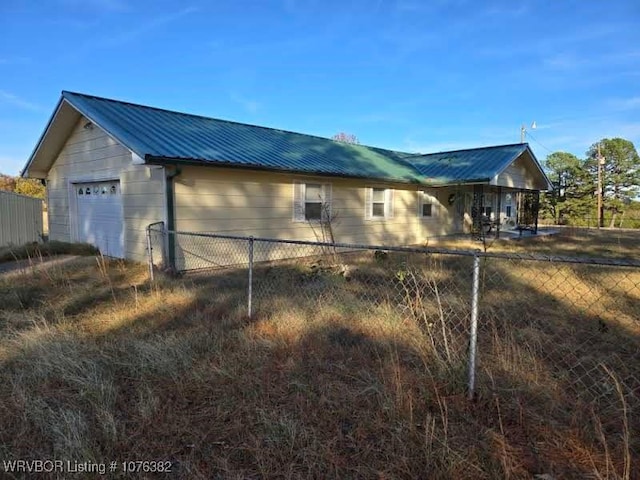 view of home's exterior featuring a garage