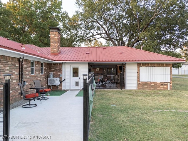 exterior space with a yard