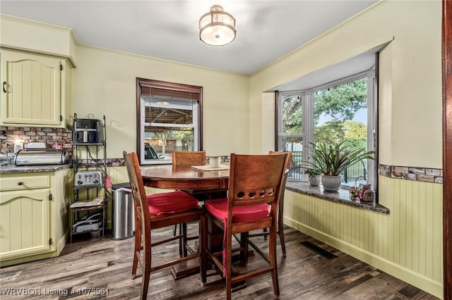 dining room with hardwood / wood-style floors