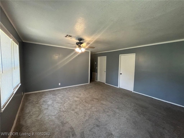 39668 S Barton, Fanshawe, OK 74935 - carpeted spare room with a textured ceiling, a ceiling fan, and ornamental molding
