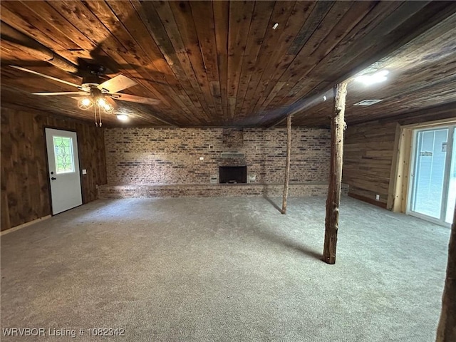 39668 S Barton, Fanshawe, OK 74935 - below grade area with wood ceiling, carpet, a ceiling fan, and wood walls