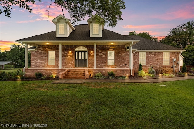 6721 Dean Rd, Alma, AR 72921 - view of front of home featuring a lawn, covered porch, and brick siding