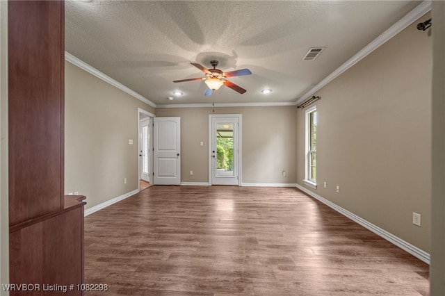 6721 Dean Rd, Alma, AR 72921 - spare room featuring a ceiling fan, wood finished floors, ornamental molding, recessed lighting, and a textured ceiling
