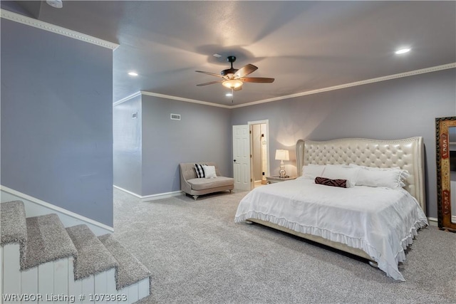 bedroom featuring carpet flooring, ceiling fan, and crown molding