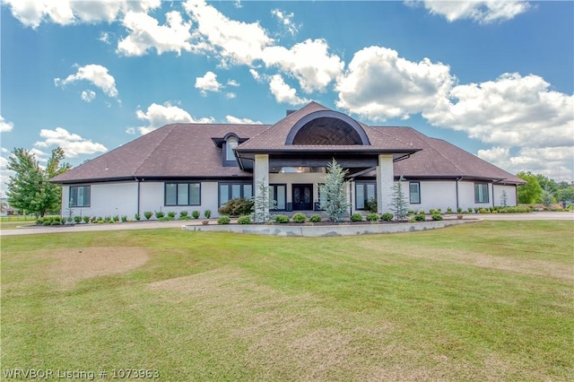 view of front of home with a front lawn